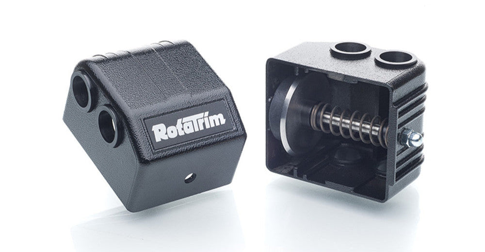 Two black plastic components with 'RotaTrim' branding on a white background