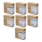 A set of Canon PFI-5100 PRO ink cartridges in various colors, including black, gray, cyan, magenta, and yellow, packaged in their individual boxes.