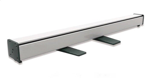 Long rectangular object with a white top and black sides on a white background