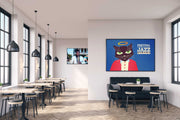 A brightly colored poster featuring an illustrated character displayed on a wall in a cafe setting.