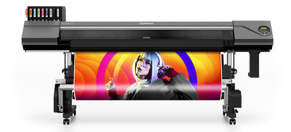 Large-format printer with colorful print on a white background