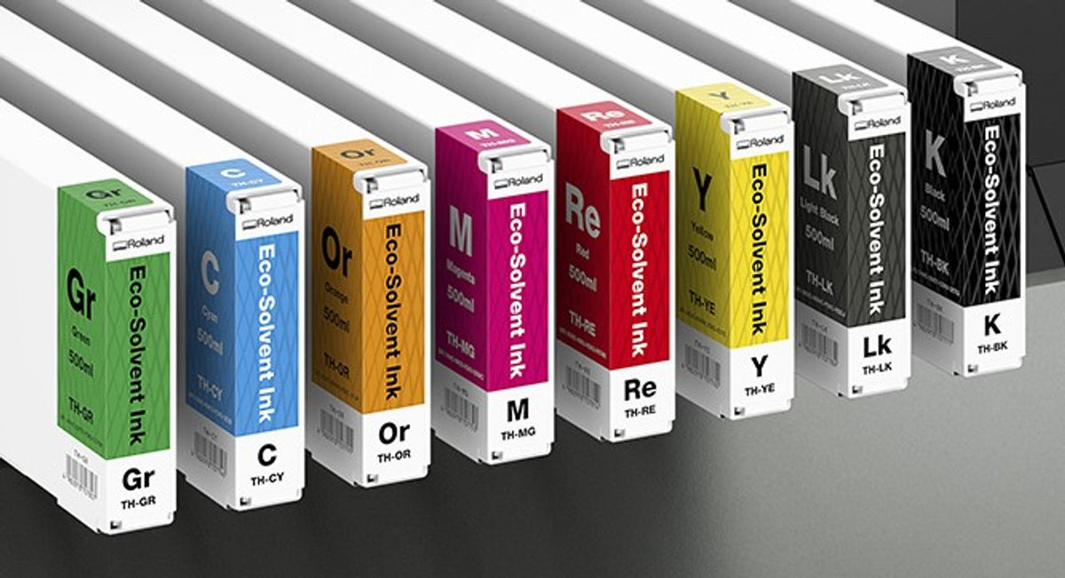 Set of Roland Eco-Solvent Ink cartridges on a gray background