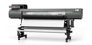 Large flatbed printer with 'Roland' branding on a white background