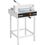 A white electric guillotine with a manual clamp, transparent safety guards, and a digital measurement readout, mounted on a white stand.