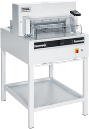 Electric and programmable guillotine with a white body and base, featuring safety guards and a touch pad for operation.