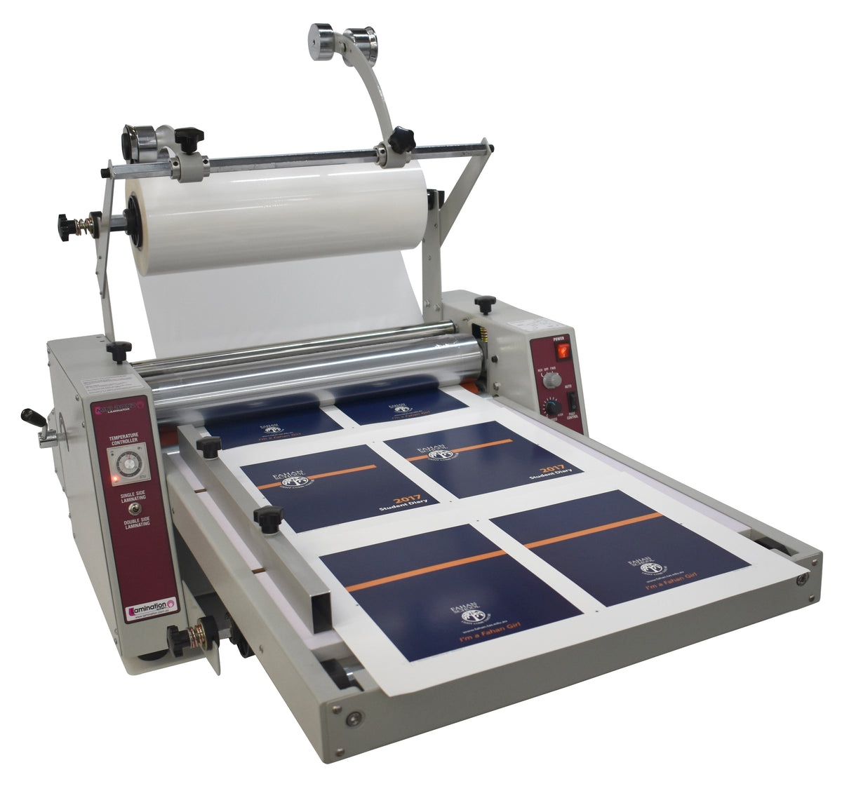 Compact desktop laminator with a chrome hot roller, control panel, and paper sheets on the tray.