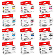 A collection of Canon PFI-1000 Lucia PRO ink cartridges in various colors, each packaged in red and white boxes.